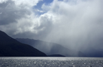 Rain falling in sheets across Lake Te Anau